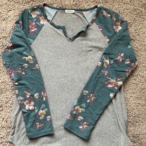 Top with floral sleeves
